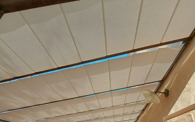 Protection thermique pour véranda : comment choisir le store idéal ?